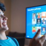 Person looking at a bright digital learning interface.